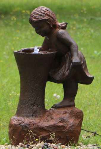 Cute Girl At Tap Water Feature Fountain with LED