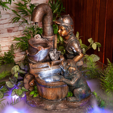 Wheelbarrow Boy and Puppy Water Feature Fountain Misty Background