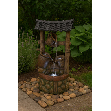 Buona Fortuna Wishing Well Fountain in the garden