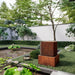 Corten Steel Davy Water Feature Fountain in the garden