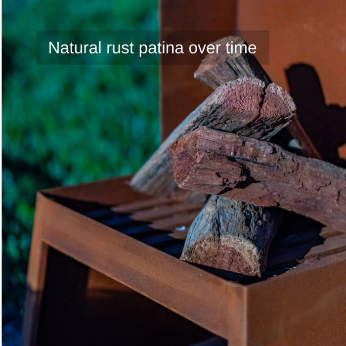 Corten Steel Fire Pit – The Obelisk with fire wood