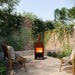 Corten Steel Fire Pit – The Spire in the patio