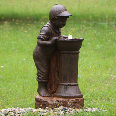 Cute Boy At Tap Water Feature Fountain with LED