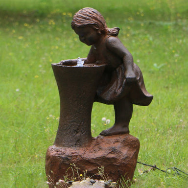 Cute Girl At Tap Water Feature Fountain with LED