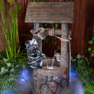 Wishing Well Water Feature Fountain With 4-Tier Buckets with misty background