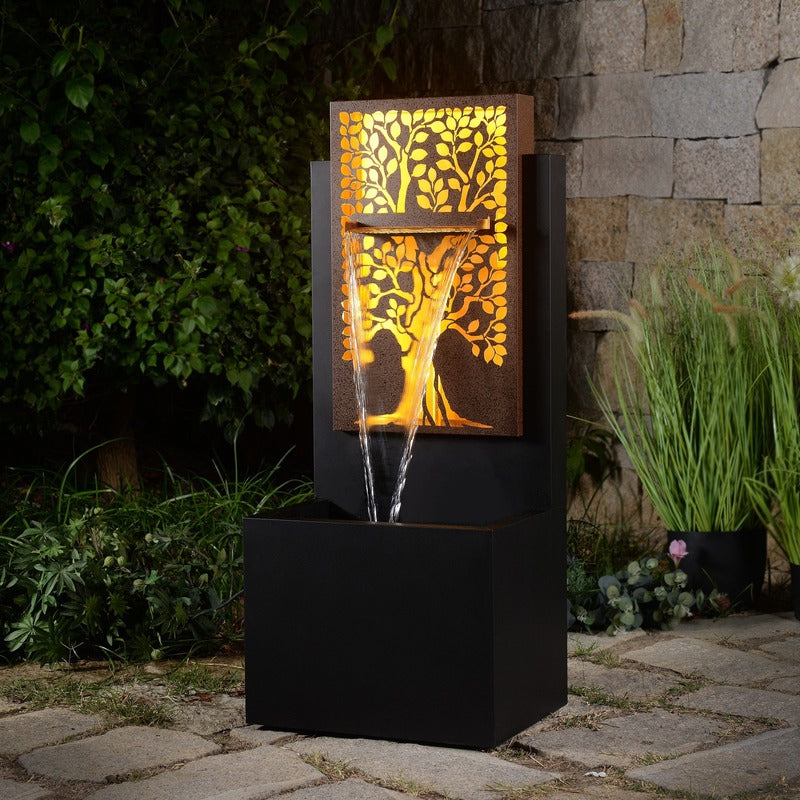 Eternal Tree Wall Water Feature sits on the ground