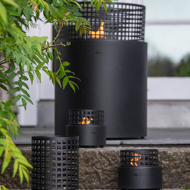 Four fire pits are sitting closely together