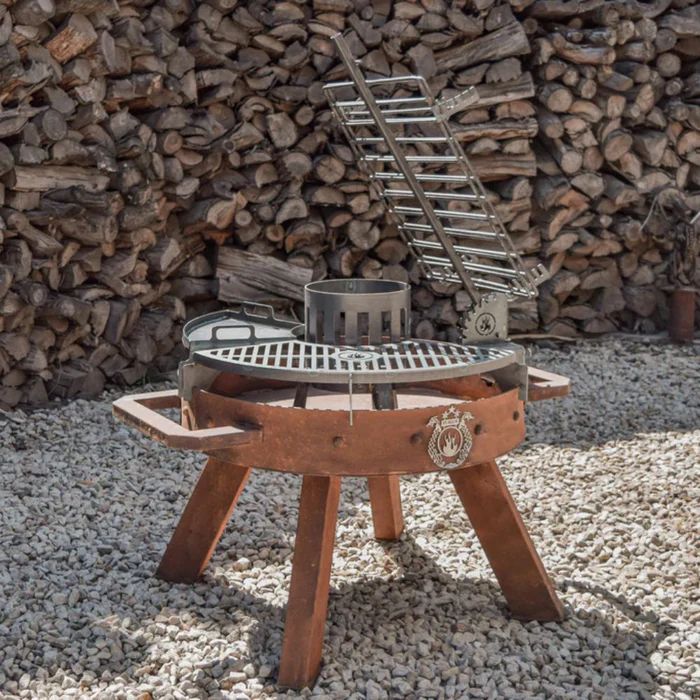 Fuegos Petit Ram Grill with wood background