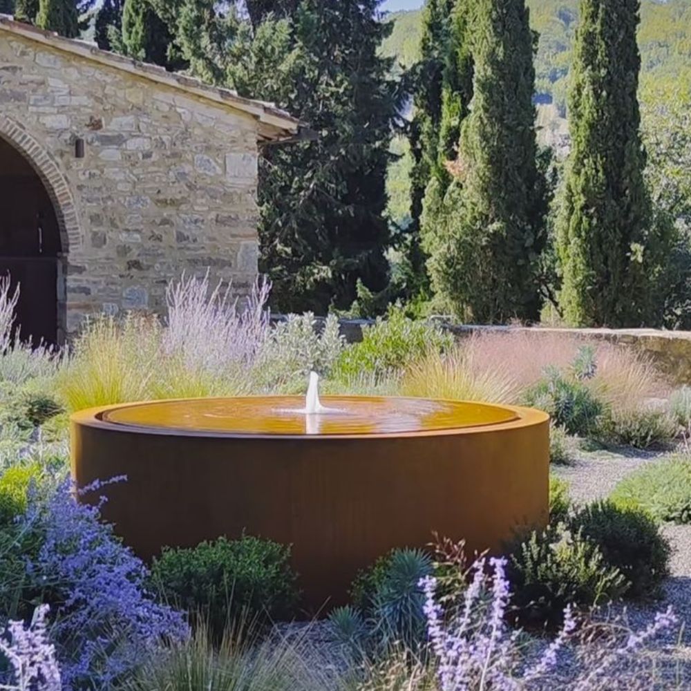 Rustic Corten Sttel Round Water Feature in the garden