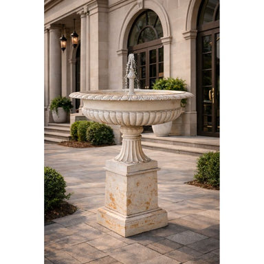 Toulouse Cast Iron Fountain stands in front of old building
