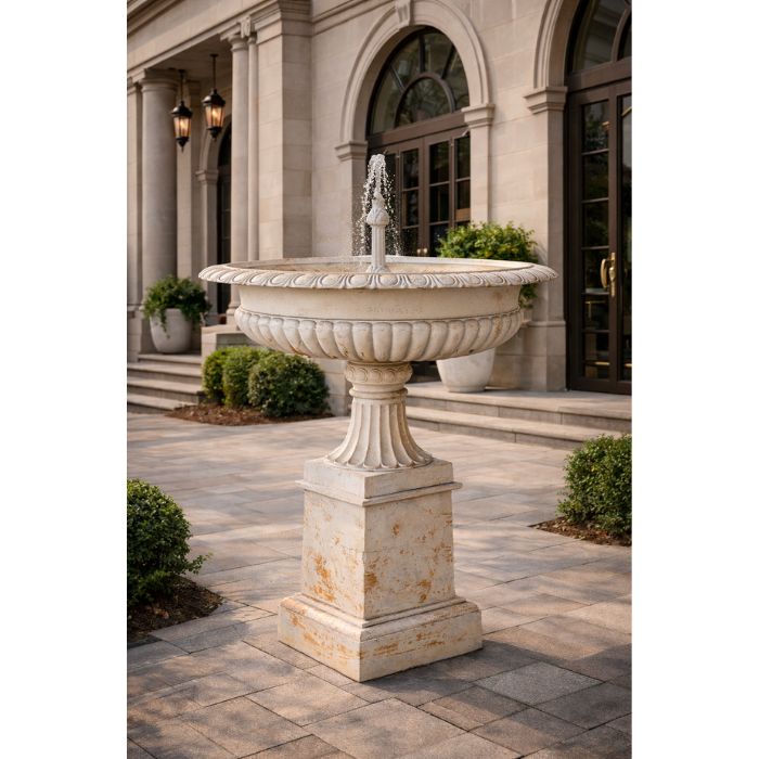 Toulouse Cast Iron Fountain stands in front of old building