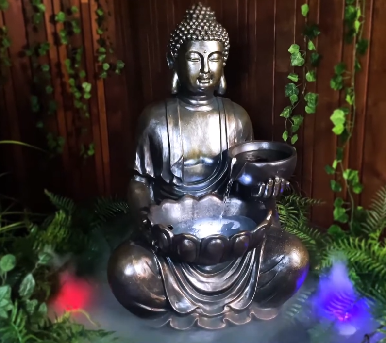 Tranquil sitting Buddha with bowl water feature fountain Slight Left angle view