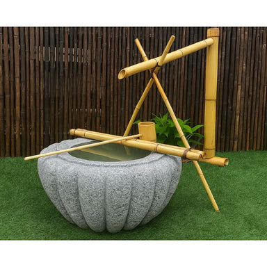 Tsukubai Shishi Odoshi Japanese Bowl Water Feature in the garden
