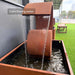 another side view of the Corten Steel Poseidon Water Fountain