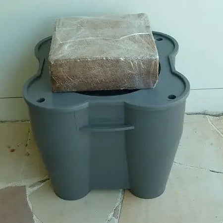 basin is sitting on the ground