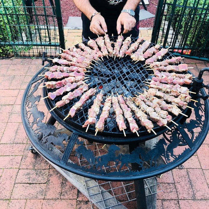 cooking chicken on the bbq plate