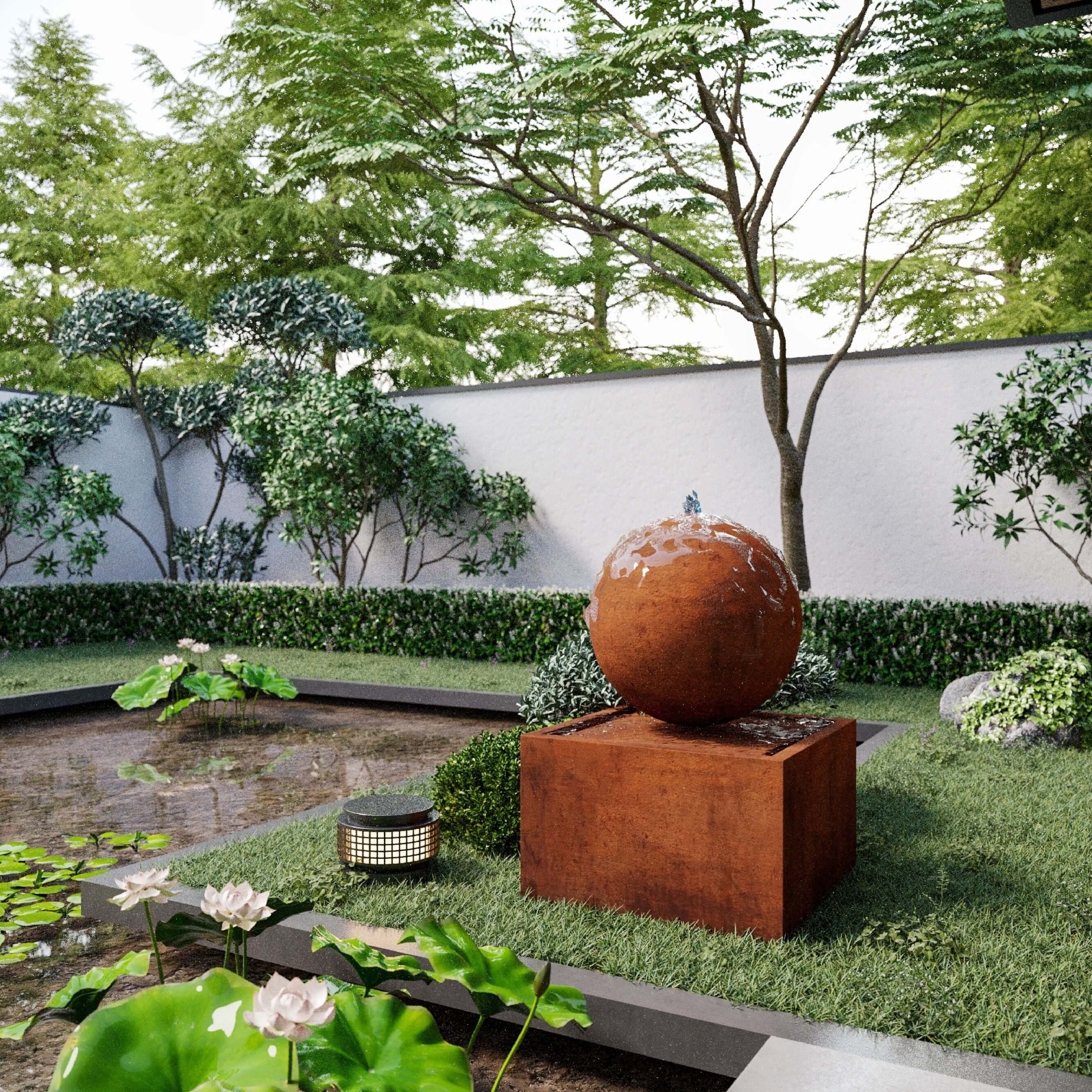 corten steel triton water feature in the garden