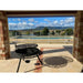 fire pit sits near the pool