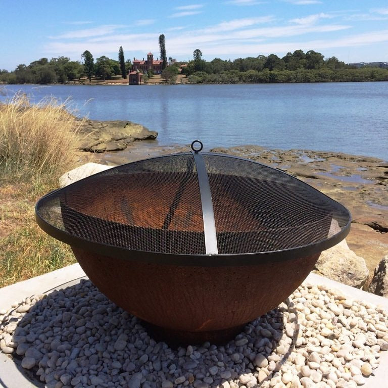 fire pit with background of the river