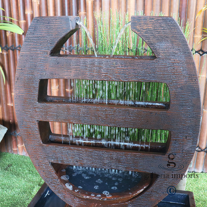 harp balinese style fountain rust with plant
