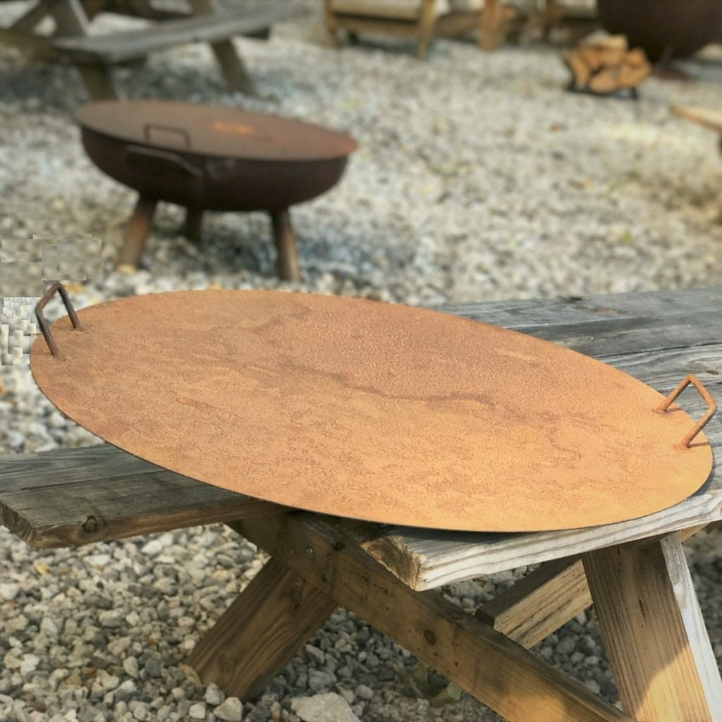 metal lid on the fire pit
