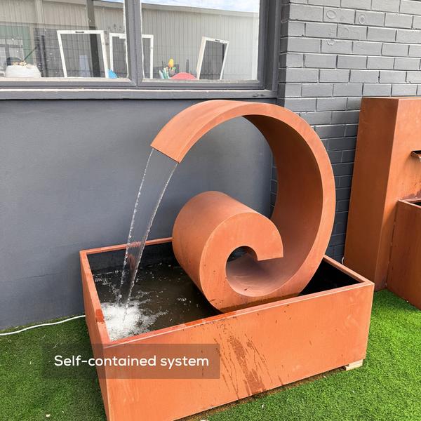 side view of the Corten Steel Poseidon Water Fountain