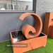 side view of the Corten Steel Poseidon Water Fountain