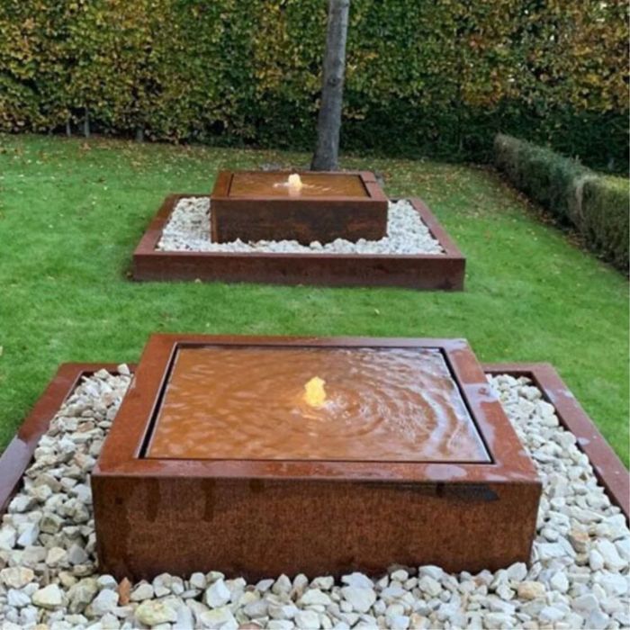 two Rustic Corten Steel Cube Water Feature in the backyard