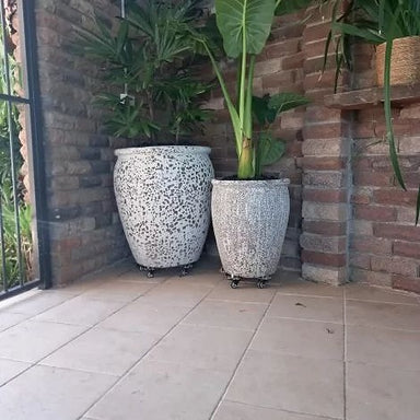 two white pots on the trolley