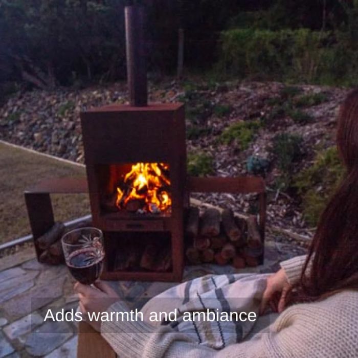 warm night with Corten Steel Fire Pit – The Spire