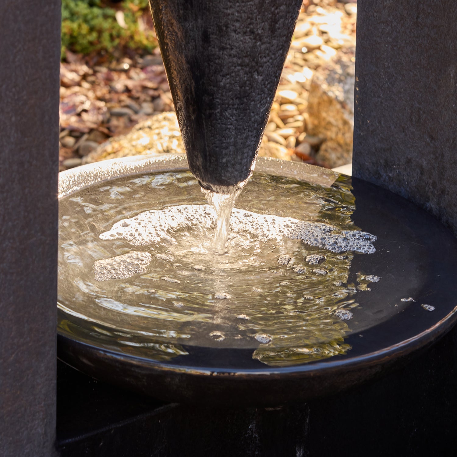 water dripping from Tempest Cone Fountain