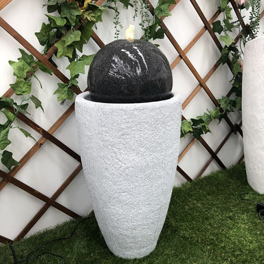 Black Ball Bubbling Vase Water Feature Slight Left view