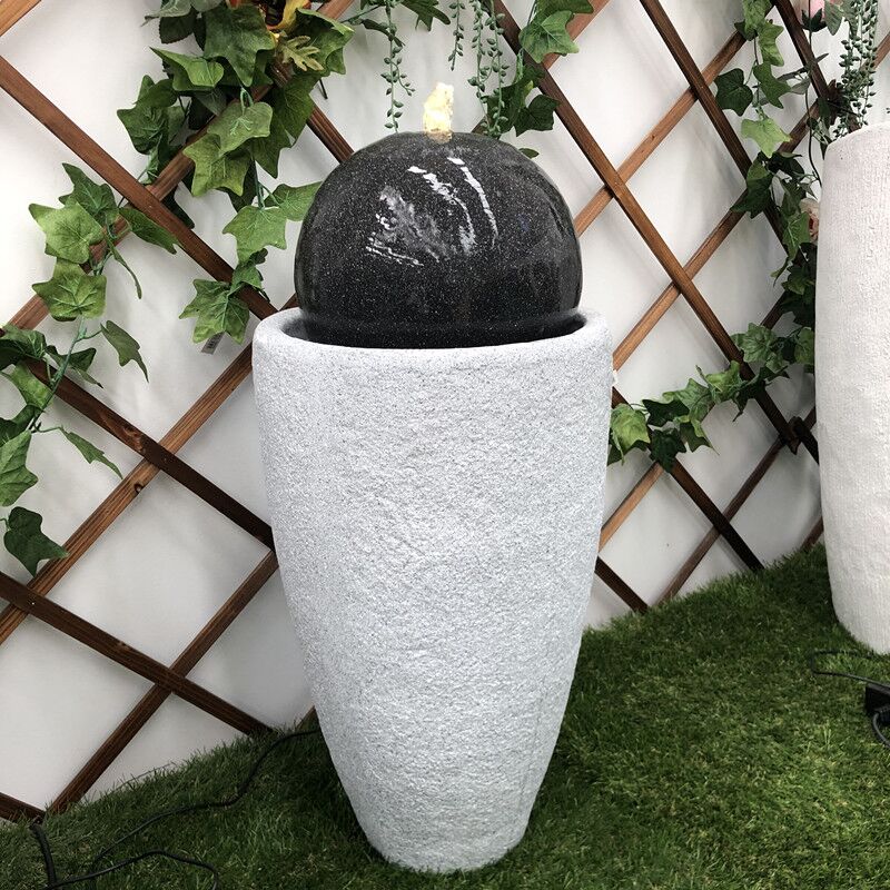 Black Ball Bubbling Vase Water Feature Slight Left view
