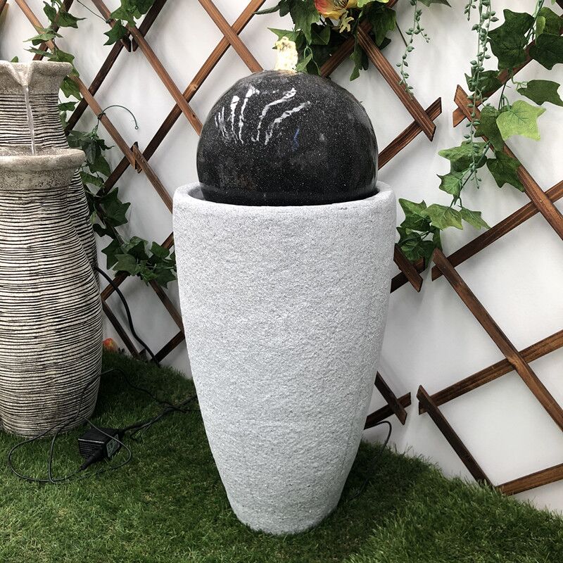 Black Ball Bubbling Vase Water Feature Slight Right View