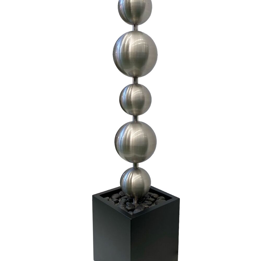 Close up of short stainless steel ball fountain