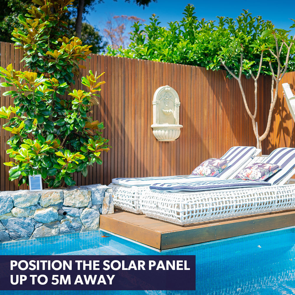 PROTEGE Solar Fountain Water Feature Pump Outdoor Wall Mount Classic with LED Lights at poolside